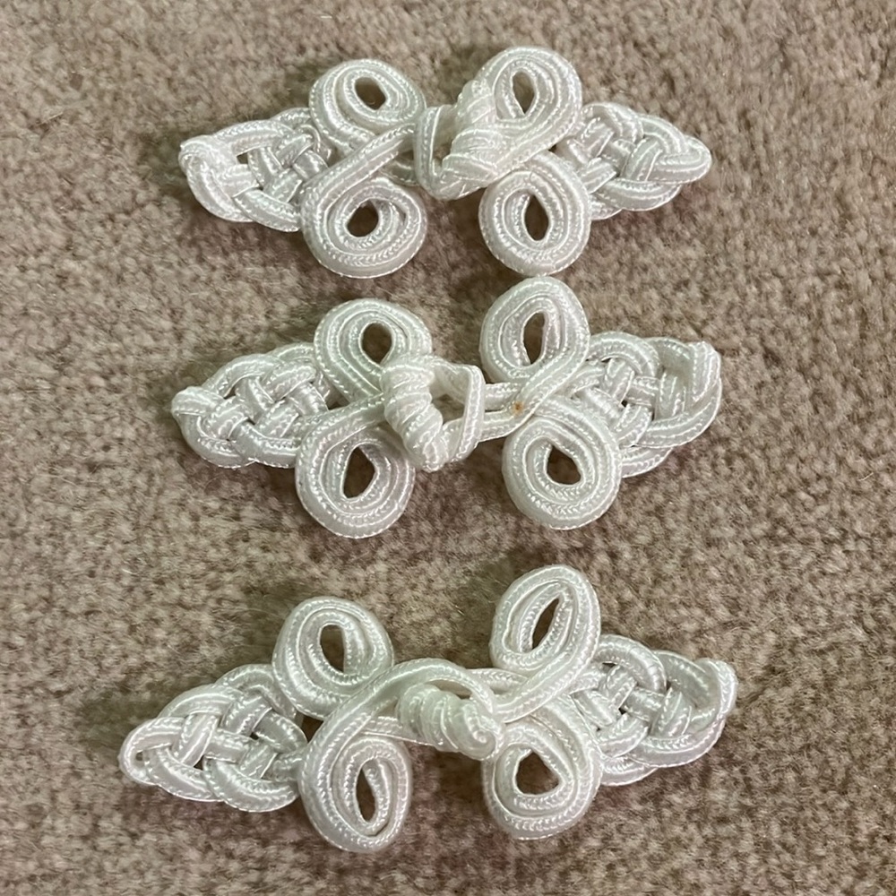 Elegant White Knot Closure Set 12 for $16
